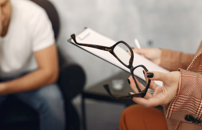 man sitting psychologist s office talking about problems Blog